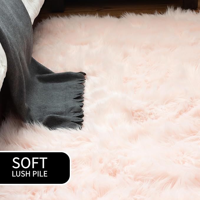 Super Area Rugs Ultra Soft & Fluffy Faux Sheepskin Rug, Light Pink 2 x 4 Feet Sheepskin Carpet for Bedroom Living Room