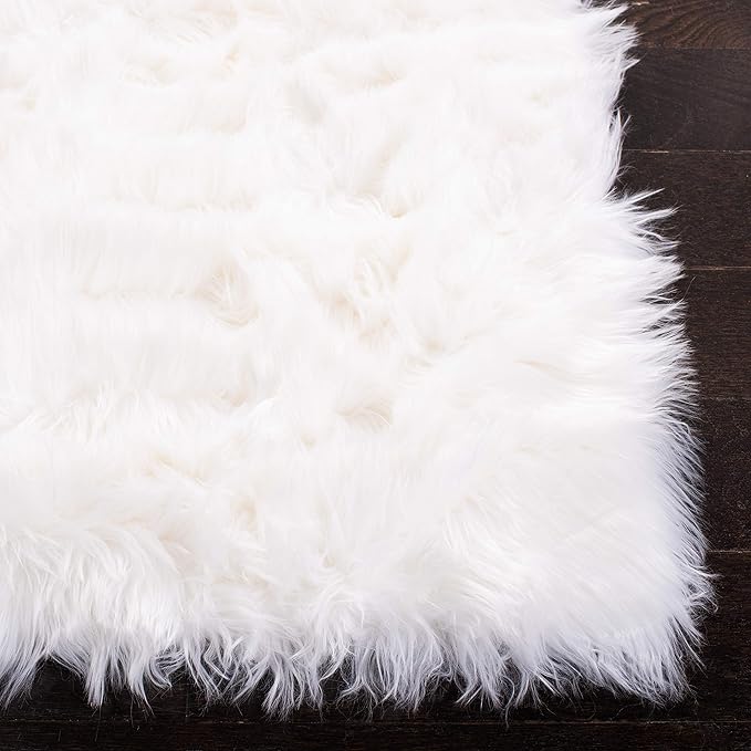 SAFAVIEH Faux Sheep Skin Collection Accent Rug - 4' x 6', Ivory, Silken Glam Design, Non-Shedding & Easy Care, 2.35-inch Thick Ideal for High Traffic Areas in Entryway, Living Room, Bedroom (FSS235A)