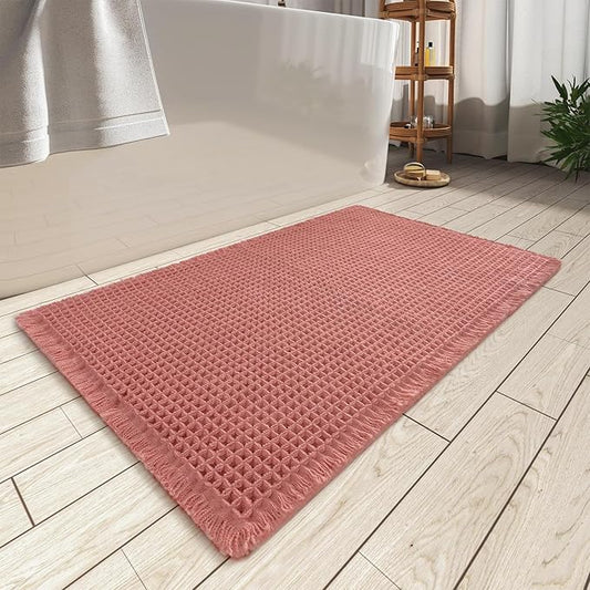 AMOAMI Upgraded Waffle Bath Mat, Super Absorbent Non Slip Bath Mats for Bathroom Floor, Machine Washable Bathroom Rugs with Tassels, Rubber Backed Bathroom Mats, Ultra Soft, 17" x 24", Coral