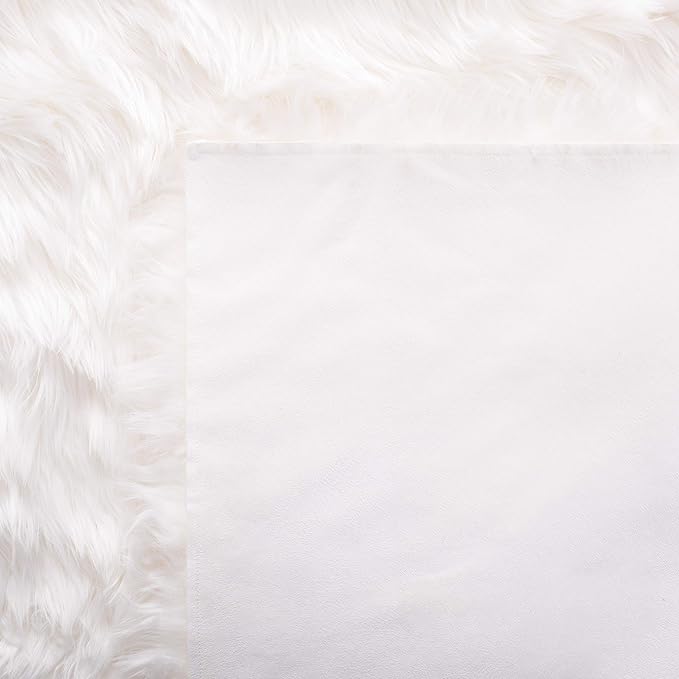 SAFAVIEH Faux Sheep Skin Collection Area Rug - 5' x 7', Ivory, Silken Glam Design, Non-Shedding & Easy Care, 2.35-inch Thick Ideal for High Traffic Areas in Living Room, Bedroom (FSS235A)