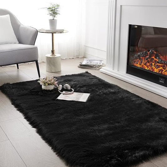 SERISSA Soft Fluffy Area Rug, Coal Black Faux Sheepskin Fur Rug, Shaggy Rug for Bedroom Floor Fuzzy Carpet for Living Room 4x6 Feet
