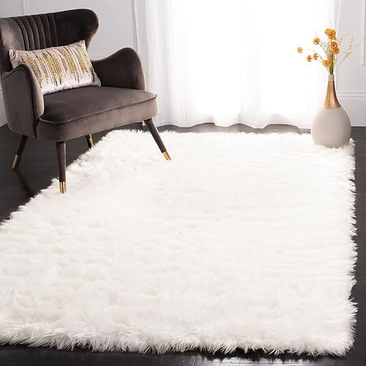 SAFAVIEH Faux Sheep Skin Collection Area Rug - 5' x 7', Ivory, Silken Glam Design, Non-Shedding & Easy Care, 2.35-inch Thick Ideal for High Traffic Areas in Living Room, Bedroom (FSS235A)